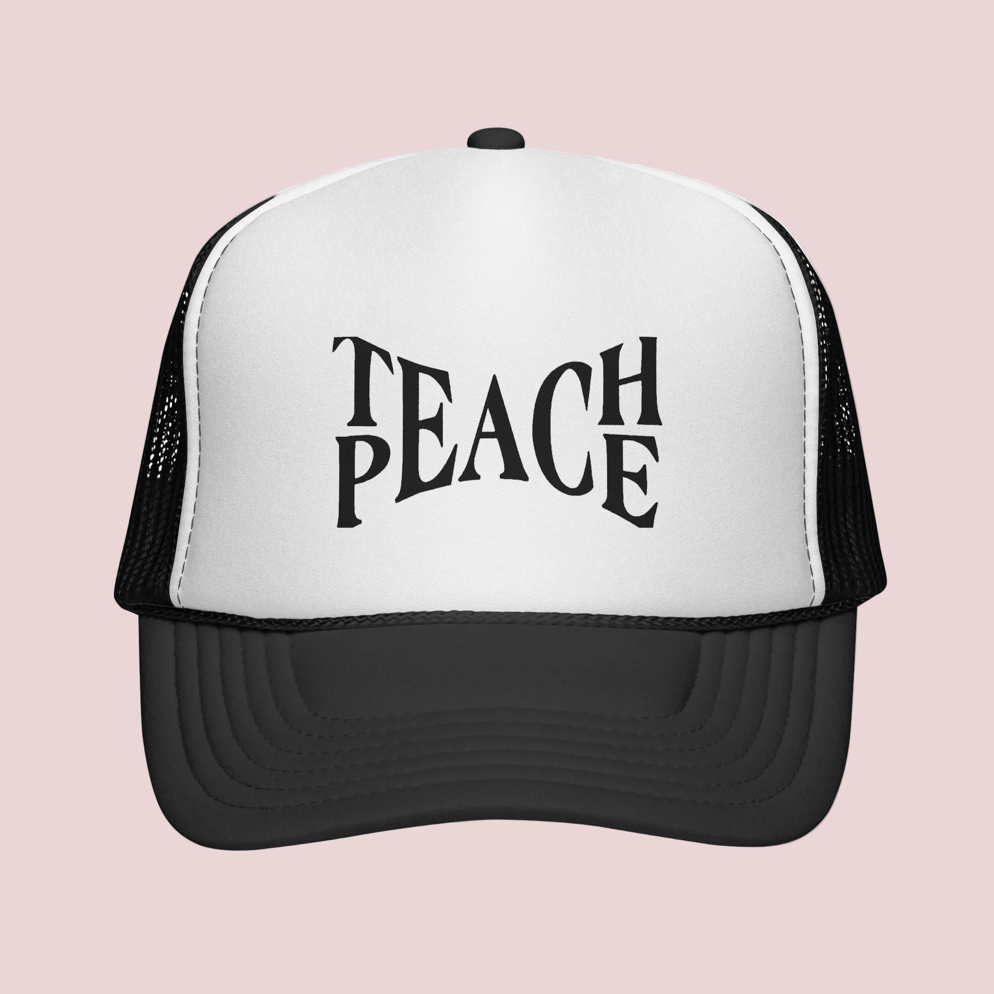 Black and white trucker cap with a black 'M' logo on a white background